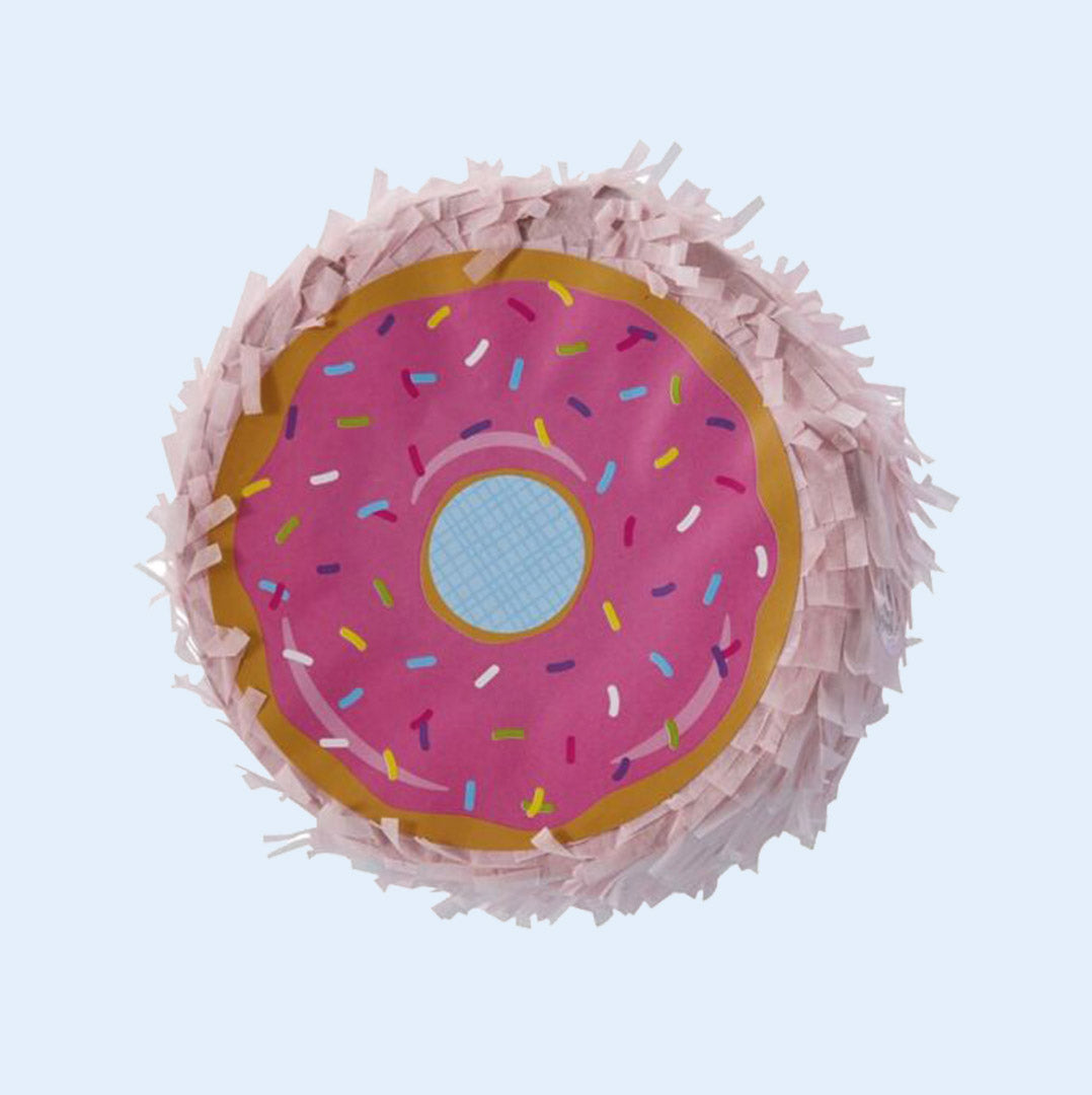 A donut-shaped bird piñata featuring a pink frosted design with colorful sprinkles and a fringe exterior, designed for foraging and shredding fun. Perfect for parrots to explore and enjoy. Available at Squawk Shop.