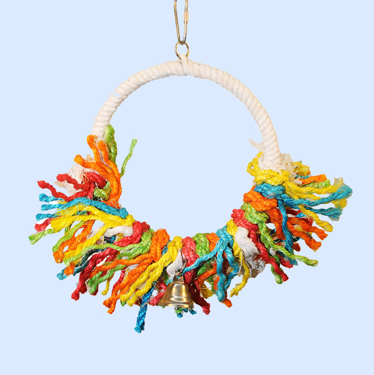 Large Rope Preening Swing from Squawk Shop, featuring colorful ropes, a circular perch, and a hanging bell for medium to large birds.
