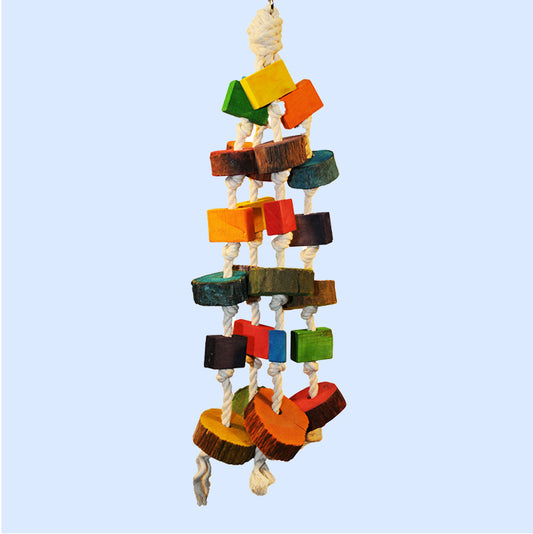 A colorful hanging bird toy made with wooden blocks and circles, strung together on sturdy rope. Designed to provide enrichment and chewing fun for parrots and other pet birds. Available at Squawk Shop.