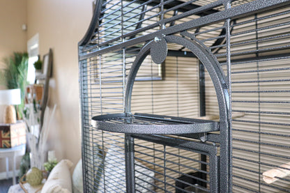 Close-up of the front door and arched swing-out tray on the Elegant Flight Cage, showcasing durable powder-coated finish and secure latch design