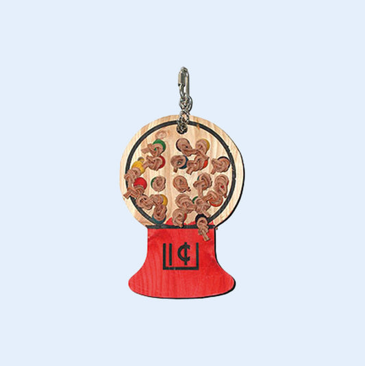 Gumball Machine bird toy from Squawk Shop, featuring a wooden gumball design with colorful cotton rope for chewing and shredding fun.