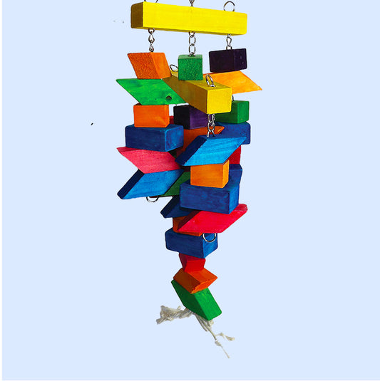 A large wooden bird toy with colorful parallelogram-shaped blocks strung together with chains and rope, designed for chewing, climbing, and enrichment.