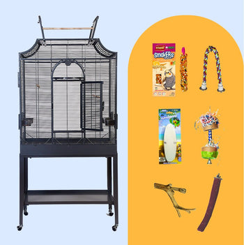 Black flight cage with pagoda top on a rolling stand, shown with the bundle's rope perch, cuttlebone and toys