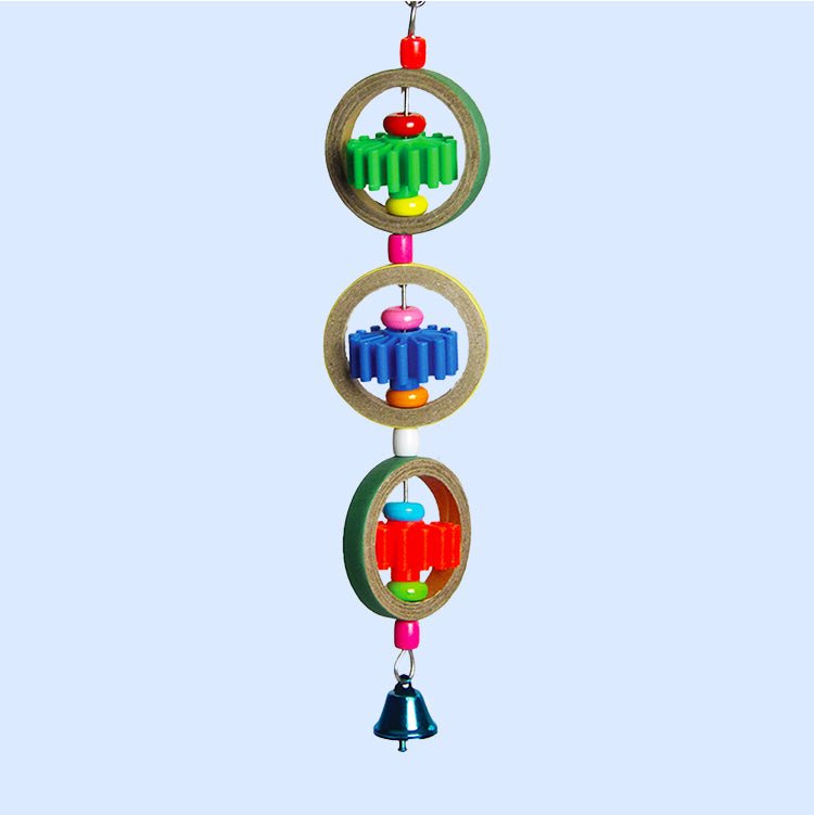 Gears and Rings bird toy from Squawk Shop, featuring colorful wooden rings, gears, beads, and a bell for interactive chewing and playtime fun.