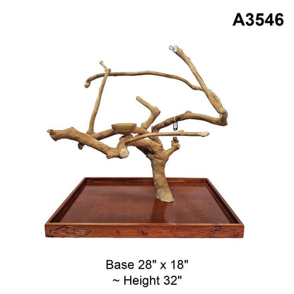 Java wood playstand A3546, broad canopy with a bowl at its centre, base 28 by 18 inches, about 32 inches tall