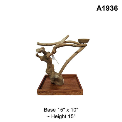 Java wood playstand A1936, arching branch with a feeding bowl, base 15 by 10 inches, about 15 inches tall