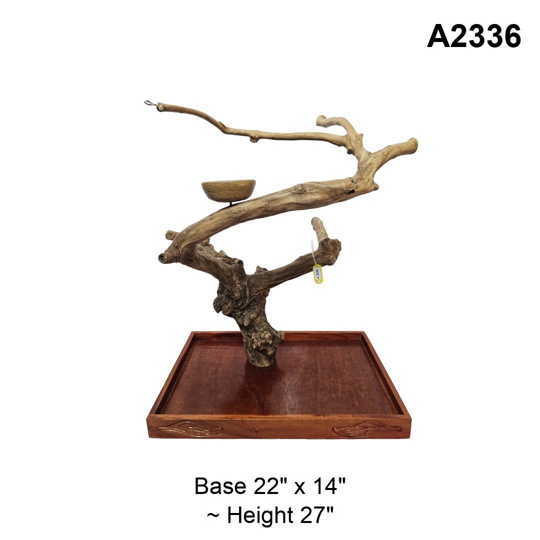 Java wood playstand A2336, long upper branch above a curved lower branch, base 22 by 14 inches, about 27 inches tall