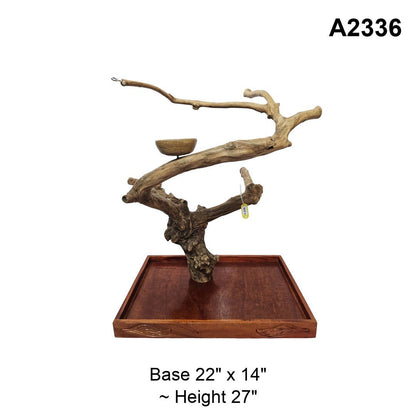 Java wood playstand A2336, long upper branch above a curved lower branch, base 22 by 14 inches, about 27 inches tall