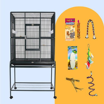 Black flight cage with flat top on a rolling stand, shown with the bundle's treat stick, rope perch and toys
