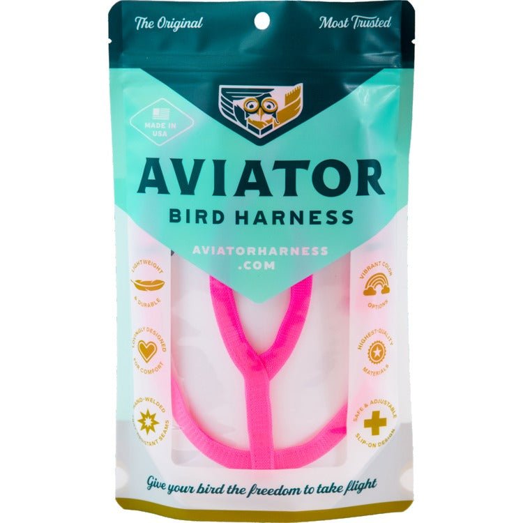 Aviator bird harness packaging with pink harness on a white background