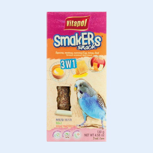 A box of Vitapol Smakers Snack 3-in-1 treat sticks for parakeets, featuring a colorful design with images of a blue parakeet, honeycomb, fruit, and eggs. The packaging highlights the mix of egg, honey, and fruit flavors. Available at Squawk Shop.